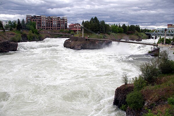 One of the many pedestrian footbridges that cross the Spokane River and provide up-close viewing of the Spokane Falls.