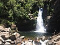 Wainui Falls, at the end of a short walk that begins in Wainui Bay.