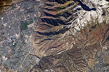 Northeast half of Traverse Mountains showing Hog Hollow and Fort Canyon, (Lone Mountain massif northeasterly; Photo North is rotated 45 Degrees, left; ISS photo; September 2005 WasatchMtns ISS011-E-13889.jpg