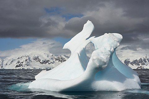 floating chunk of glacier ice - sculpted by nature