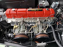 The Nash Ambassador inline-six engine with twin Carter carburetors 1953 Nash-Healey convertible roadster in light green at Hershey 2019 AACA 7of9.jpg