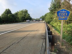 Garden State Parkway South entering Essex County 2018-07-17 07 28 23 View south along New Jersey State Route 444 (Garden State Parkway) between Exit 153 and Exit 151, entering Bloomfield Township, Essex County from Clifton, Passaic County, New Jersey.jpg