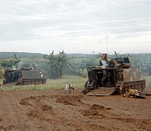 The 4.2 Mortar Platoon of D/16 Armor, 173rd Airborne, on a fire mission in Operation Waco in Vietnam