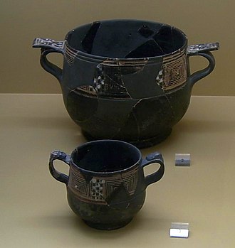 Two kantharoi in the Agora Museum at Athens, circa 225-210 BC. AMA - West Slope Kantharoi.jpg