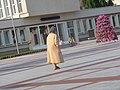 An old woman in the Ignalina plaza (Time changes everything and everybody) - panoramio.jpg