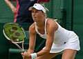 Andrea Hlaváčková competing in the first round of the 2015 Wimbledon Qualifying Tournament at the Bank of England Sports Grounds in Roehampton, England. The winners of three rounds of competition qualify for the main draw of Wimbledon the following week.