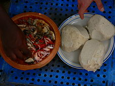 Ghanaian "Banku Ne Mako" (banku and pepper-tomato sauce)