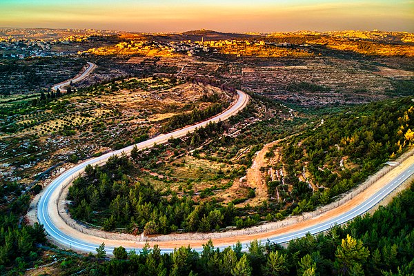 The Israeli West Bank barrier and Beit Surik behind it