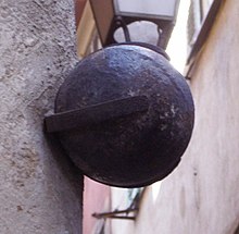 A cannonball fired by the Franco-Turkish fleet, now in a street of Nice Boulets de la rue droite.jpg