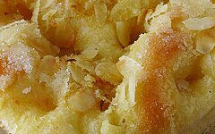 Close-up of texture on top. Melted pieces of butter create depressions on the surface.