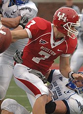 In the Houston Cougars' spread offense, Case Keenum became the NCAA's all-time leading passer. Case Keenum vs Air Force Falcons in 2008.jpg