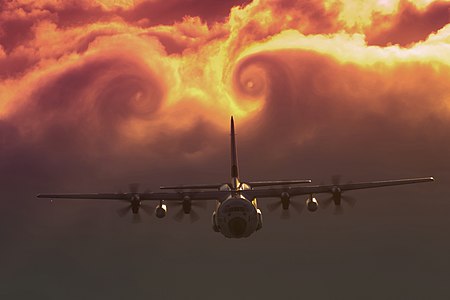 Clouds swirl after a C-130J