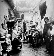 Italian immigrants in a conventillo in Buenos Aires. Italian is the largest single ethnic origin of European immigrants in the country, and became a major part of modern Argentine society. Conventillo1.jpg