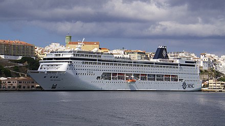 One of many large cruise ships inside Maó harbour.