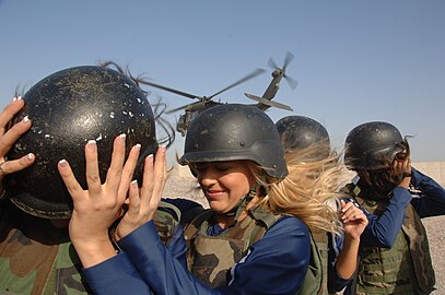 Dallas Cowboys Cheerleaders come to a forward operating base in Iraq to entertain troops.