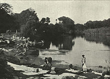 Washermen washing along the Adyar River near Saidapet, c. 1905 Dhobies (Indian Washermen).jpeg