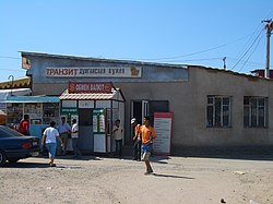 Many restaurants in Bishkek advertise "Dungan cuisine" (Dunganskaia kukhnia, Dunganskaya kukhnya) E7869-Dordoy-Bazaar.jpg