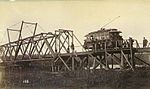 Excursion party on an electric streetcar of the Grant Street Electric Railway at a wooden drawbridge near South park, Duwamish (LAROCHE 164).jpeg