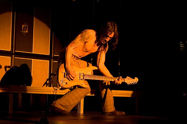 Nuno Bettencourt provides rhythm guitar on the video mix version.