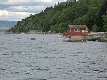 Flaskebekk coastline, looking north from Nordre Flaskebekk pier.