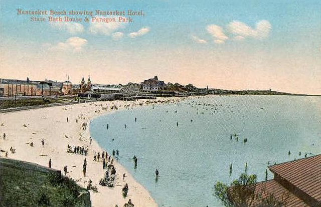 Nantasket Beach and the Nantasket Hotel, State Bath House and Paragon Park in the background, circa 1910.