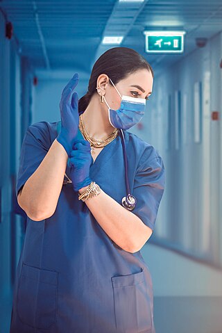 woman with gloves and stethoscope