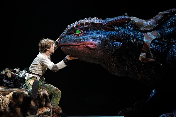 Hiccup and a mechanical model of Toothless at How to Train Your Dragon Live Spectacular