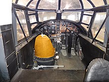 The cockpit of Avro C.19 141, displayed at the Irish Air Corps Museum, 2014 Inside the AVRO XIX, the first Air Corps aircraft with a monoplane design and a retractable undercarriage. Sistership to the AVRO Anson serving from 1930s - 1970s (12119468396).jpg