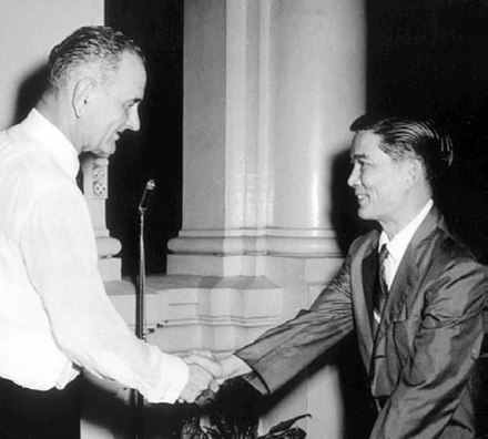 Ngô Đình Nhu (right), shaking hands with then US Vice President Lyndon B. Johnson in 1961