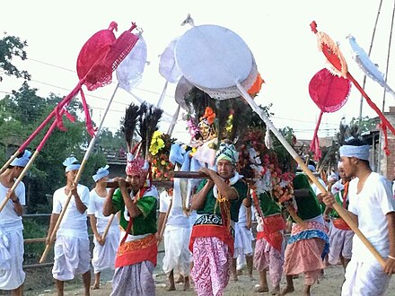 The Lai Lam Thokpa ceremony (palanquin lifting and roaming) being performed as a part of a Lai Haraoba festival in a village at Kakching