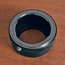 This lens adapter is a passive adapter designed for mounting a Nikon F-mount lens to a Micro Four Thirds camera. Lens Adapter.jpg