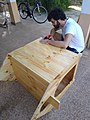 Me building the wooden pet house.jpg
