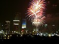 In addition to a fireworks show, Miami lights one of its tallest buildings with the patriotic red, white and blue color scheme on Independence Day