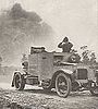 Man looking at an explosion in an armoured car