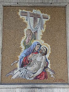 Mosaic on the left side of the entrance to the church representing Jesus died by crucifixion