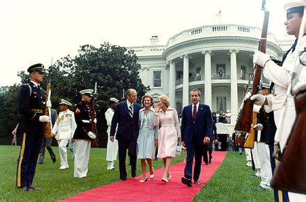 The Fords escort the Nixons as they depart the White House on Nixon's final day as president, August 9, 1974.