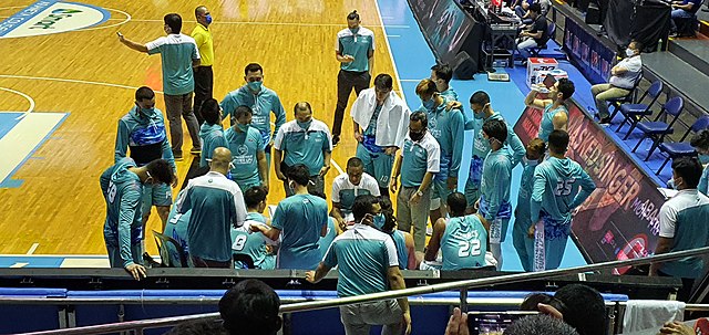 Topex Robinson and the Fuel Masters during a timeout.