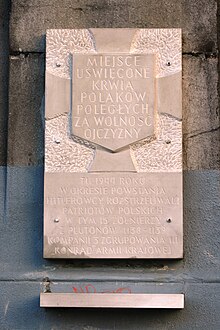 Tchorek plaque under Poniatowski Bridge commemorating murdered soldiers of 1138 and 1139 Home Army platoons. PL Warsaw new plaque under Poniatowski Bridge.JPG