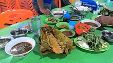 Palembang cuisine Brengkes Tempoyak Lais and Pindang.jpg