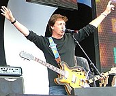 Paul McCartney playing a Casino at Live 8 in 2005. Paul McCartney & Bono Live8.jpg