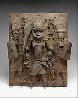 Benin plaque with warriors and attendants; 16th–17th century; brass; 47.6 cm (18Samfuri:3/4 in.) height; Metropolitan Museum of Art. The Benin Bronzes led to a greater appreciation in Europe of African culture and art. Initially, it appeared incredible to the discoverers that people "supposedly so primitive and savage" were responsible for such highly developed objects[8]