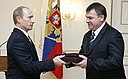Putin handed over to the GRU Hero of Russia certificate bestowed on Soviet intelligence officer George Koval.jpg