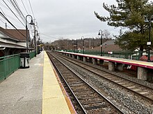 The station as viewed from the south end of Platform A, looking north. Roslyn LIRR Station, Roslyn Heights, NY January 25, 2023 A.jpg