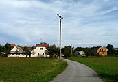 Čeština: Pohled ke vsi Rozpoutí v okrese Český Krumlov, Jihočeský kraj, od západu. English: Eastbound view of the village of Rozpoutí, Český Krumlov District, South Bohemian Region, Czech Republic.