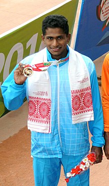 Sajan Prakash (INDIA) with the winner's Gold Medal in the Men's swimming 200m Butterfly category, at the 12th South Asian Games-2016.jpg