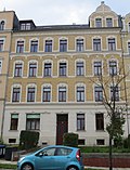 Apartment building in closed development with front garden