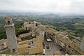 Torri Rognosa (Torre Rognosa), San Gimignano hija belt medjevali żgħira b'ħitan fuq għoljiet fil-provinċja ta' Siena, it-Toskana, fit-tramuntana taċ-ċentru tal-Italja.