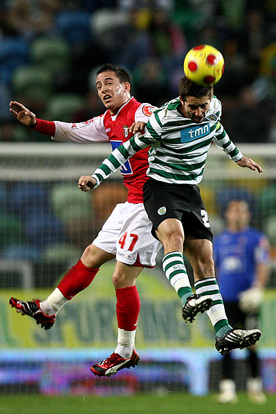 Moutinho (right) battling João Pereira in 2009