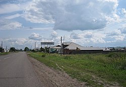 at the entrance of the village