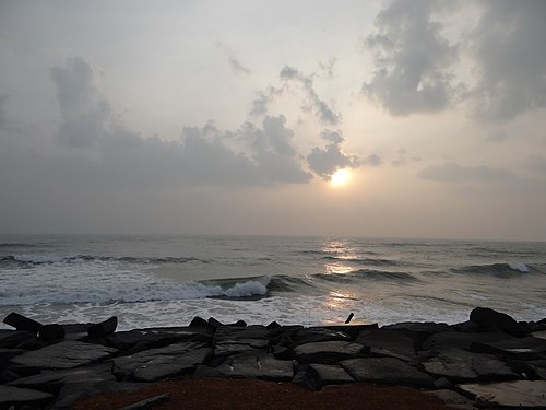 Early morning walk by the bay of bengal near the fishing harbour in Pondicherry